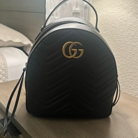 Gucci Black Chevron Backpack with Gold Accents Gucci Black GG Marmont Backpack (€1.385) ❤ liked on  main image 3